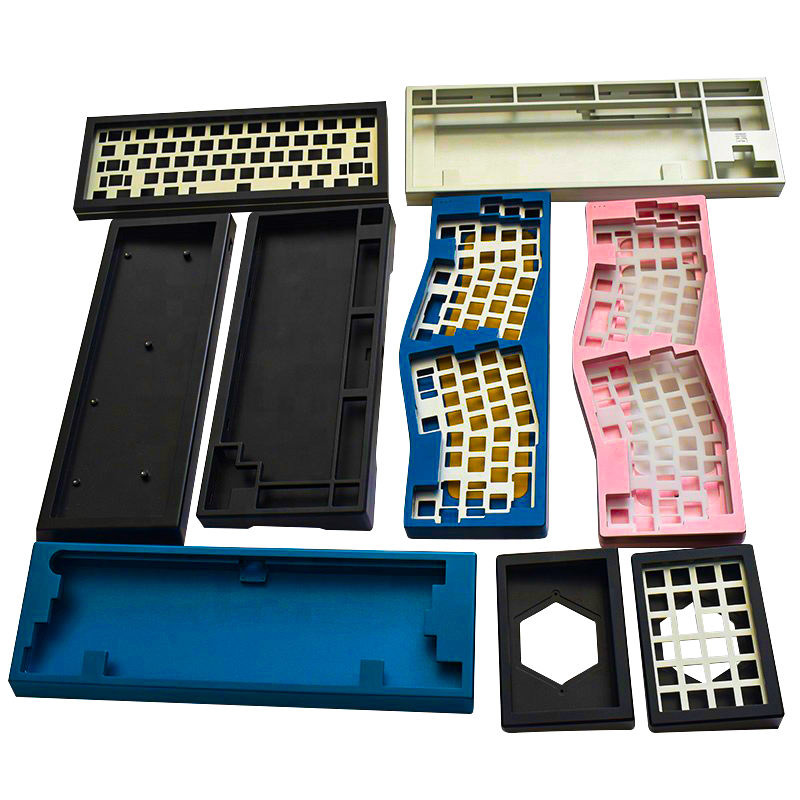 A variety of CNC-machined aluminum keyboard cases in different colors and layouts