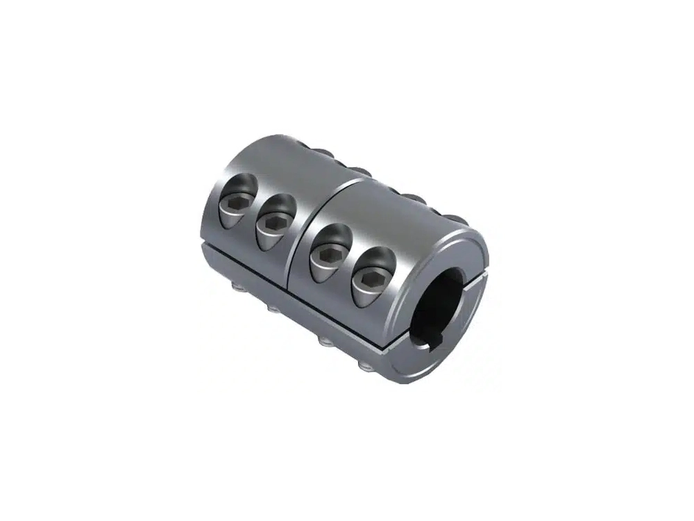 Split-muff coupling consisting of two semi-cylindrical cast iron halves bolted together around shafts, allowing easy assembly without shaft removal for medium-duty applications.