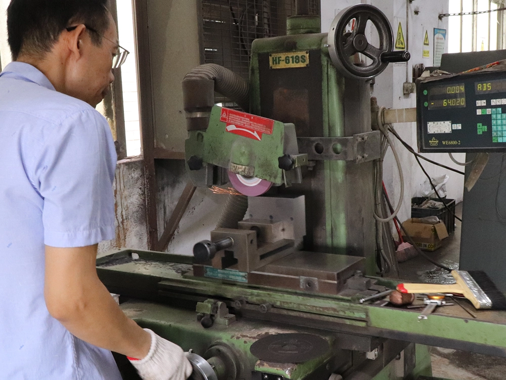 Grinding station with Max 200mm capacity for precision fabrication of industrial enclosures.