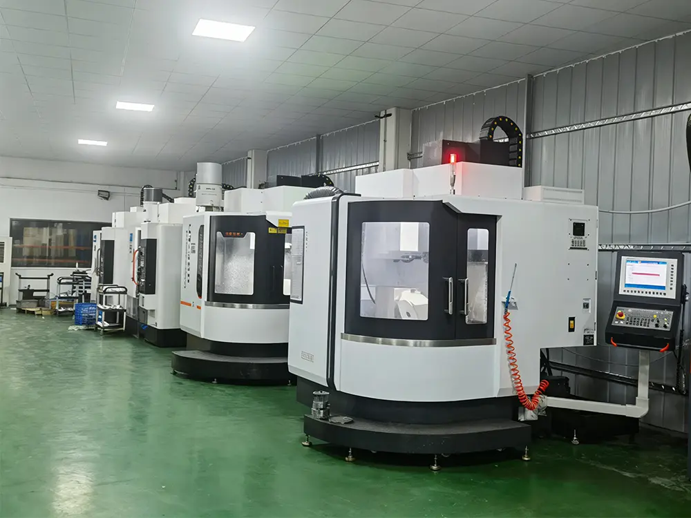 Multi-axis CNC machining center workshop floor with multiple 5-axis machines